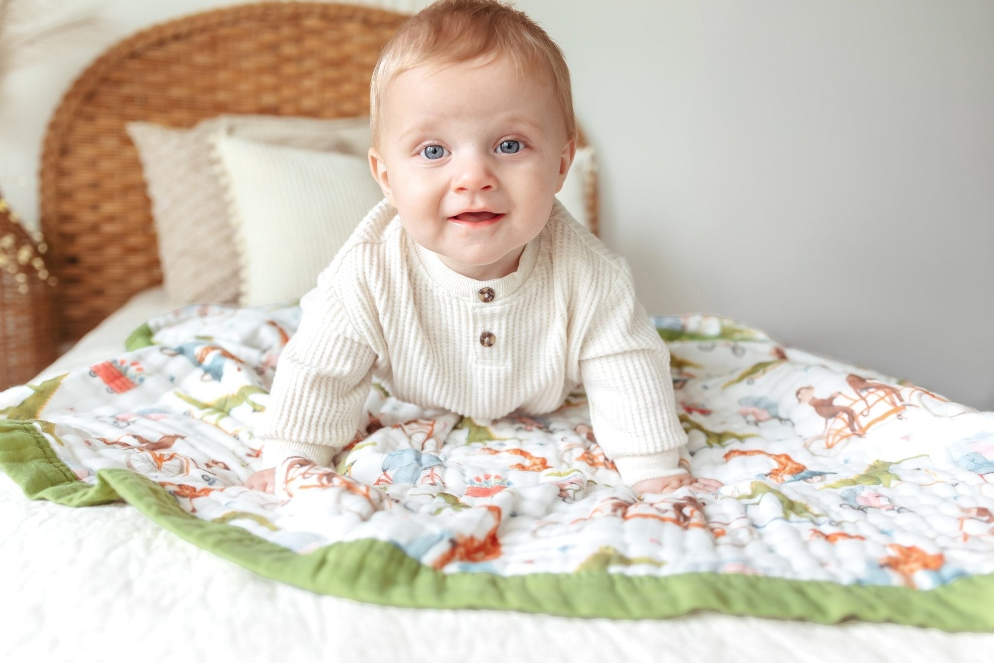 Smiling baby picture with the natchiketa blanket