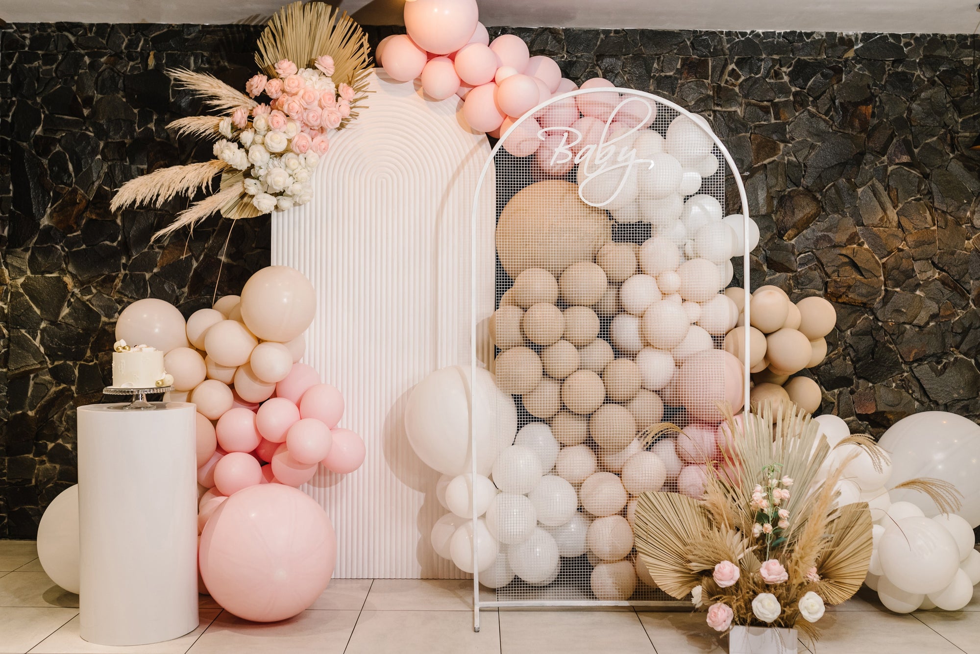 Balloon backdrop showing the baby shower.