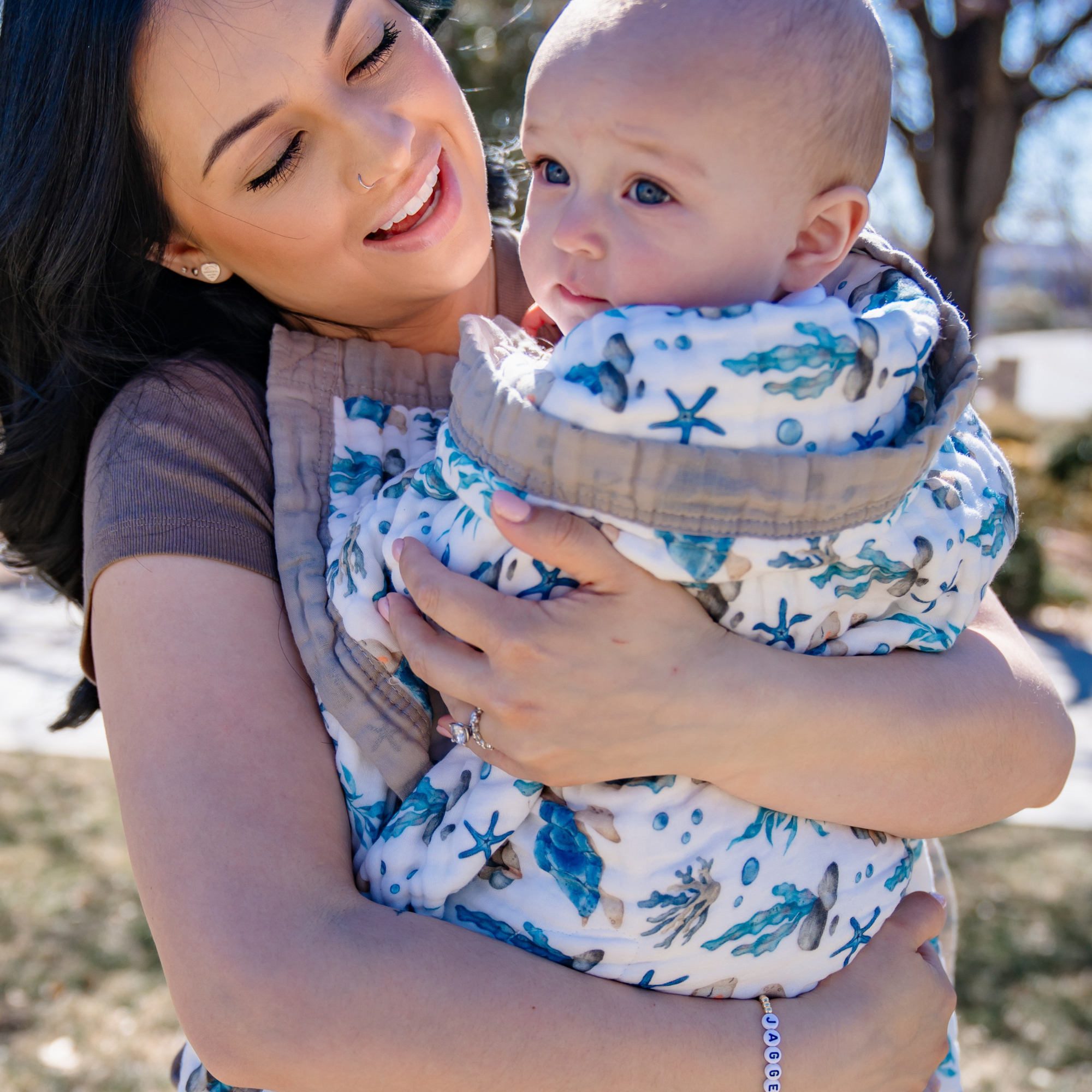 Baby wrapped at Natchiketa Sea Turtle Organic Muslin Blanket
