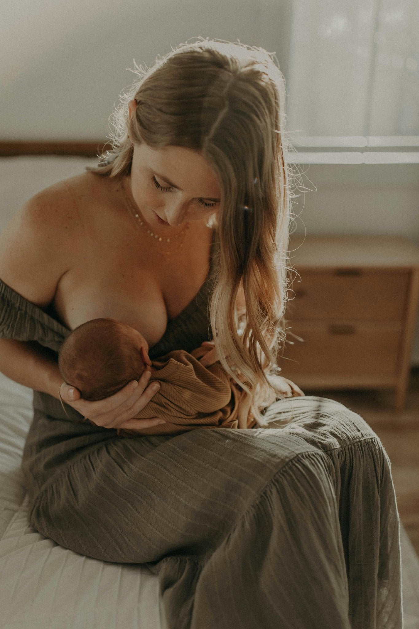 Women breastfeeding her child